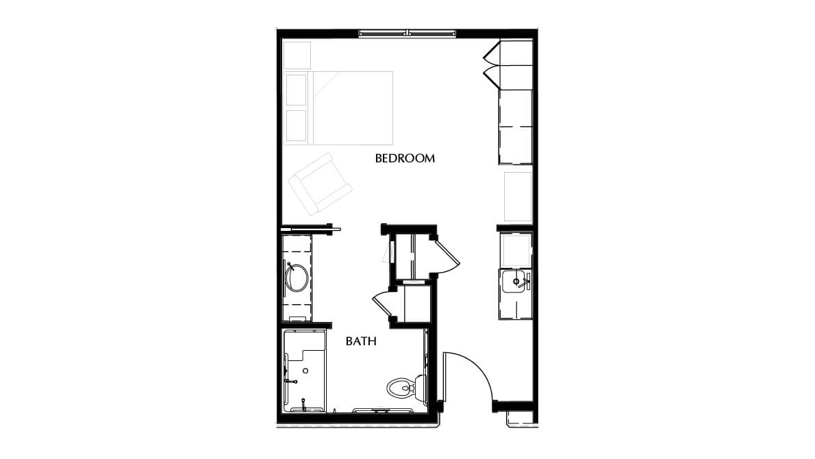 A simple floor plan featuring a bedroom and a bathroom layout.