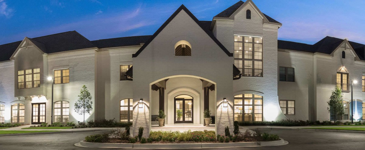 Modern residential house with elegant architecture and night lighting.