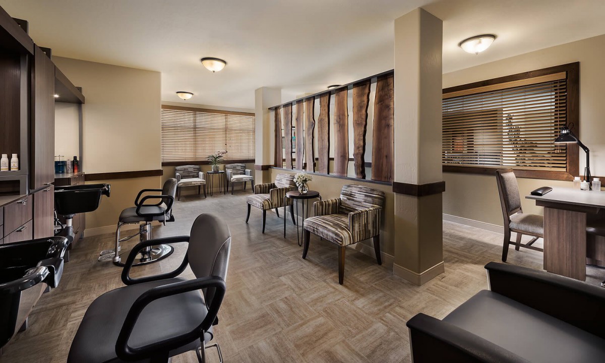 A modern waiting room with comfortable seating and stylish decor.
