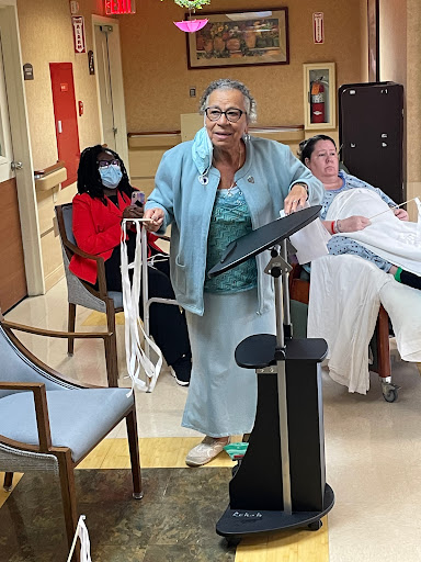 An uplifting moment in a rehabilitation center, where individuals engage in recovery activities.