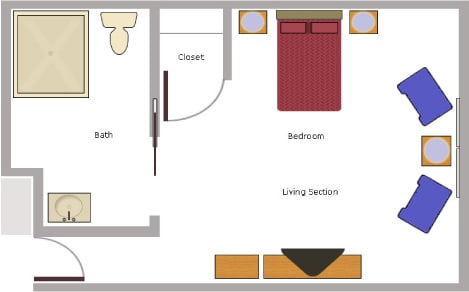 A simple apartment floor plan showing a bedroom, bathroom, closet, and living section.