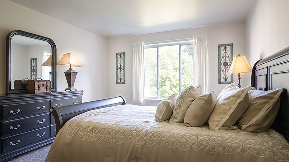Bright and airy bedroom with elegant decor.