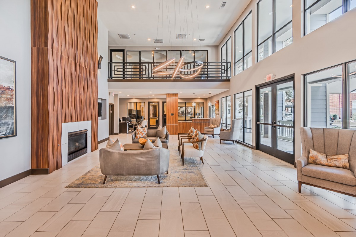 A modern, spacious lobby with comfortable seating and abundant natural light.