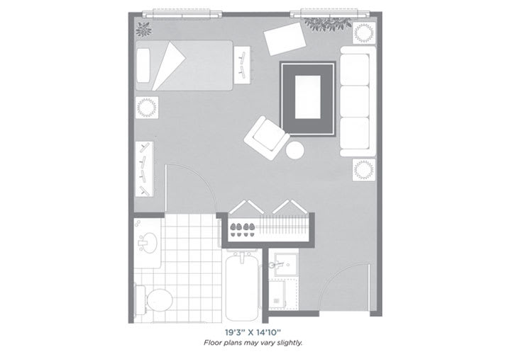 A floor plan of a studio apartment with designated areas for living, sleeping, and cooking.