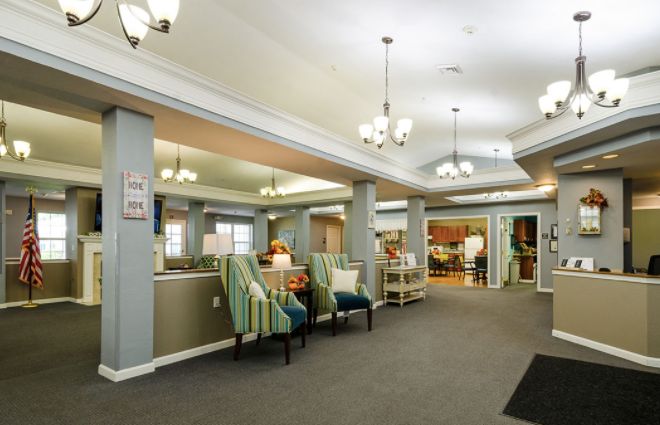 A spacious lobby with comfortable seating and elegant lighting.