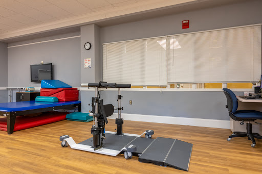 A well-equipped gym space featuring specialized fitness equipment designed for effective workouts.