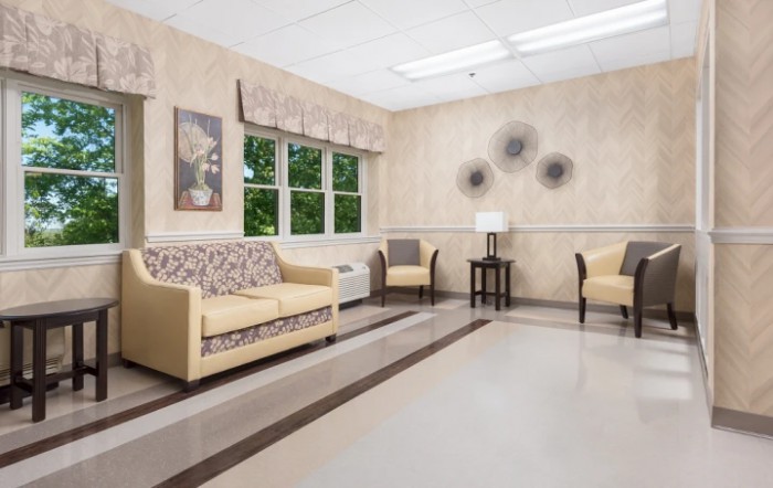 A well-lit waiting room with comfortable seating and modern decor.