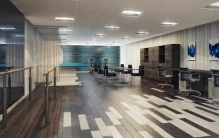 A modern office space with a conference area and stylish interior design.