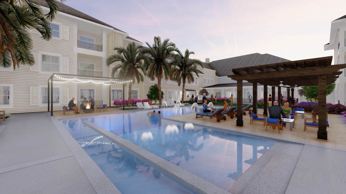 A serene hotel swimming pool area at dusk, surrounded by palm trees and comfortable seating.