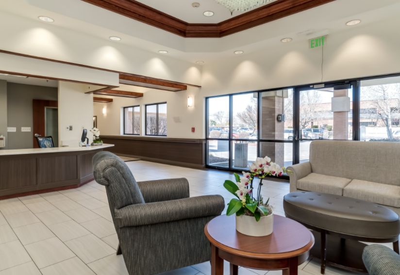 A modern lobby with comfortable seating and natural lighting.