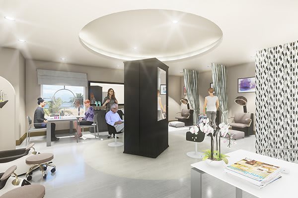 A modern and spacious living area with stylish furniture and people interacting.