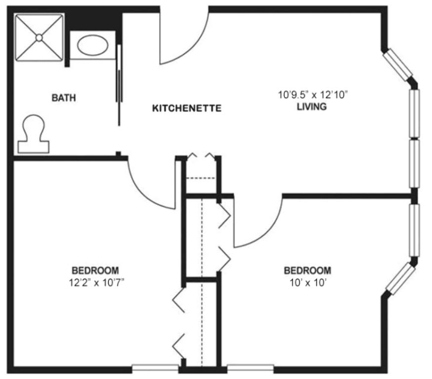 A floor plan of a two-bedroom apartment with a kitchenette, living room, and bathroom.