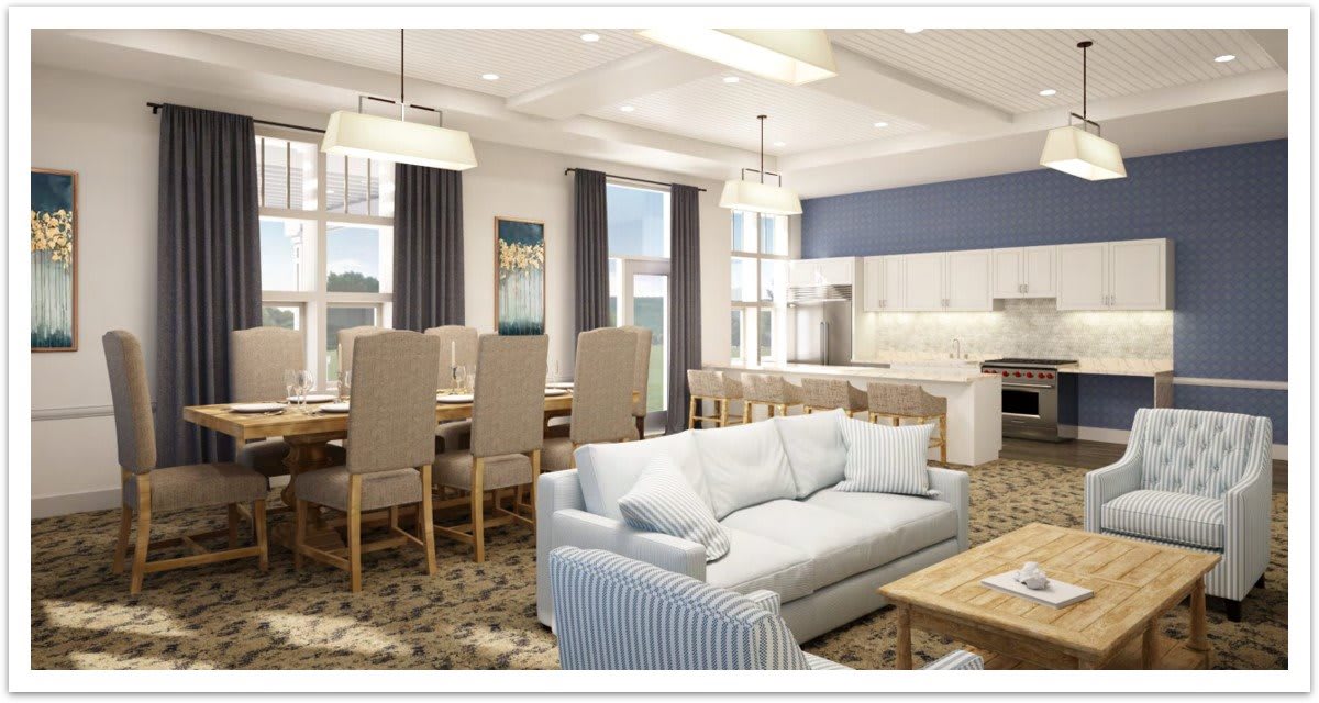 Modern open-plan living room and dining area with a connected kitchen.