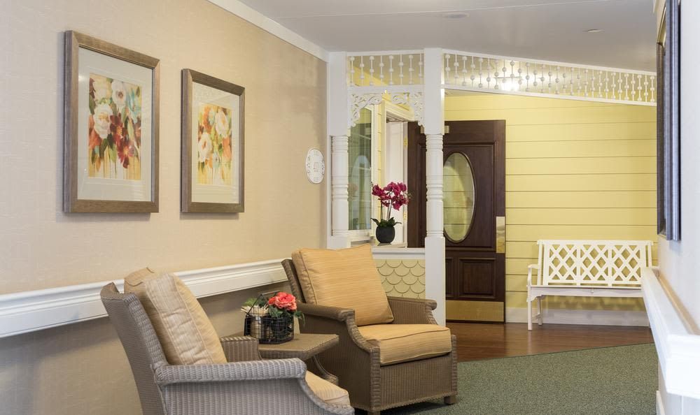 A cozy living room with comfortable seating and elegant decor.