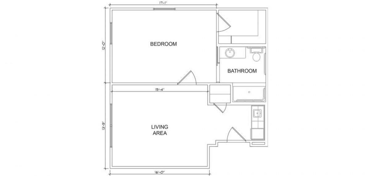 A simple floor plan showing a layout with a bedroom, bathroom, and living area.