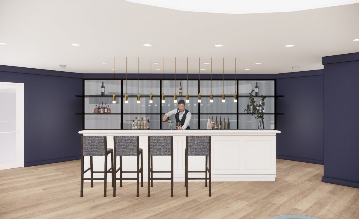 A modern bar setup with a bartender preparing drinks behind a white counter.