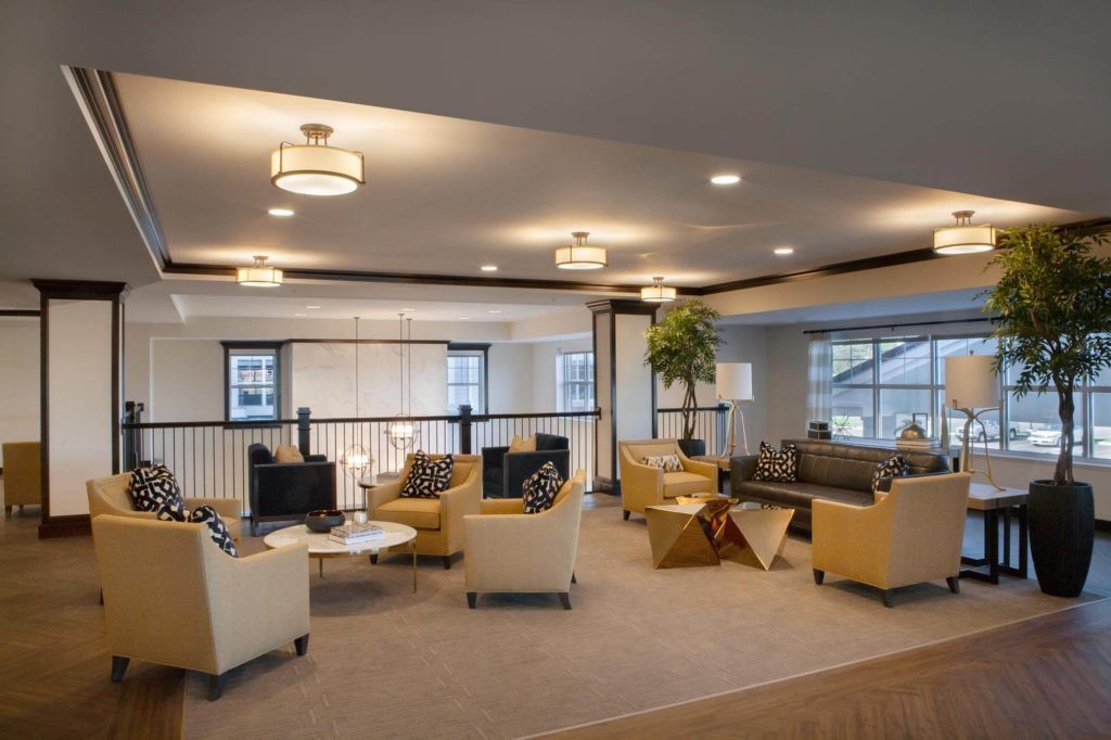 A modern lounge area with stylish seating and ambient lighting.