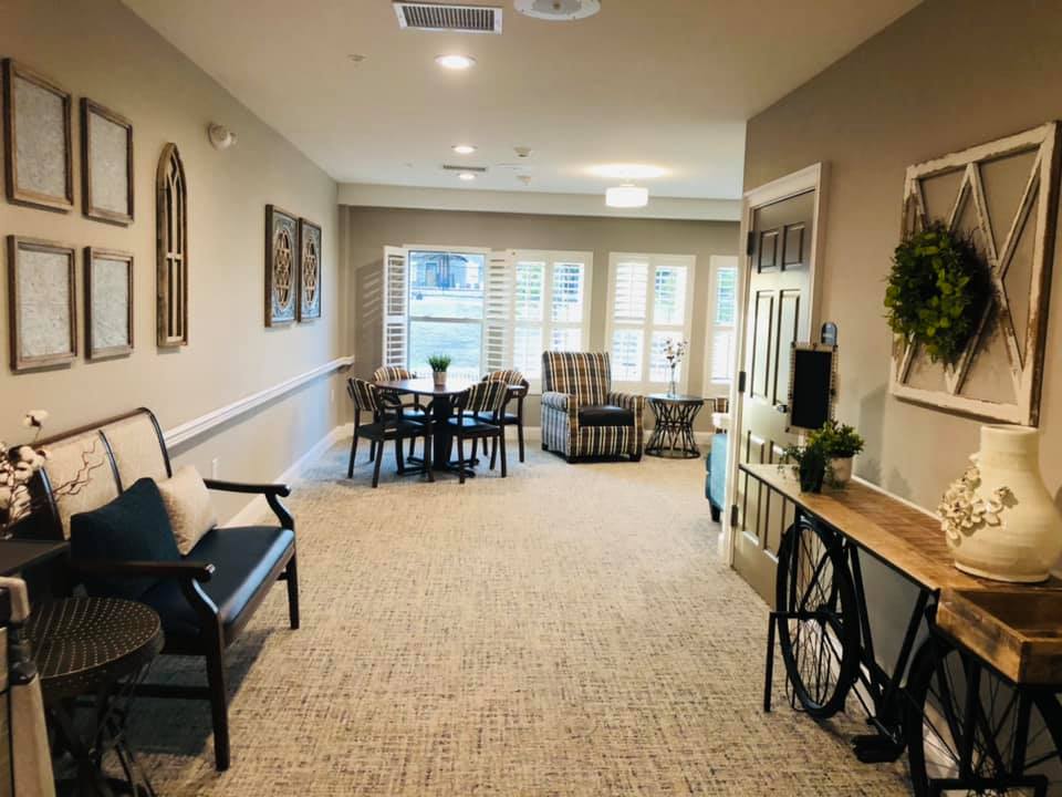 A cozy living room with comfortable seating and warm decor.