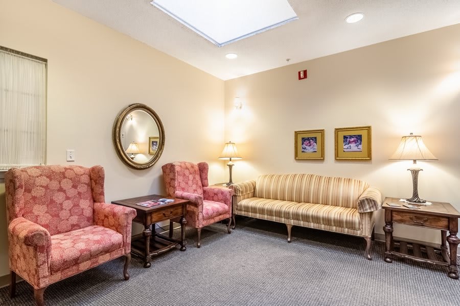 Cozy waiting room with stylish furniture and decor.