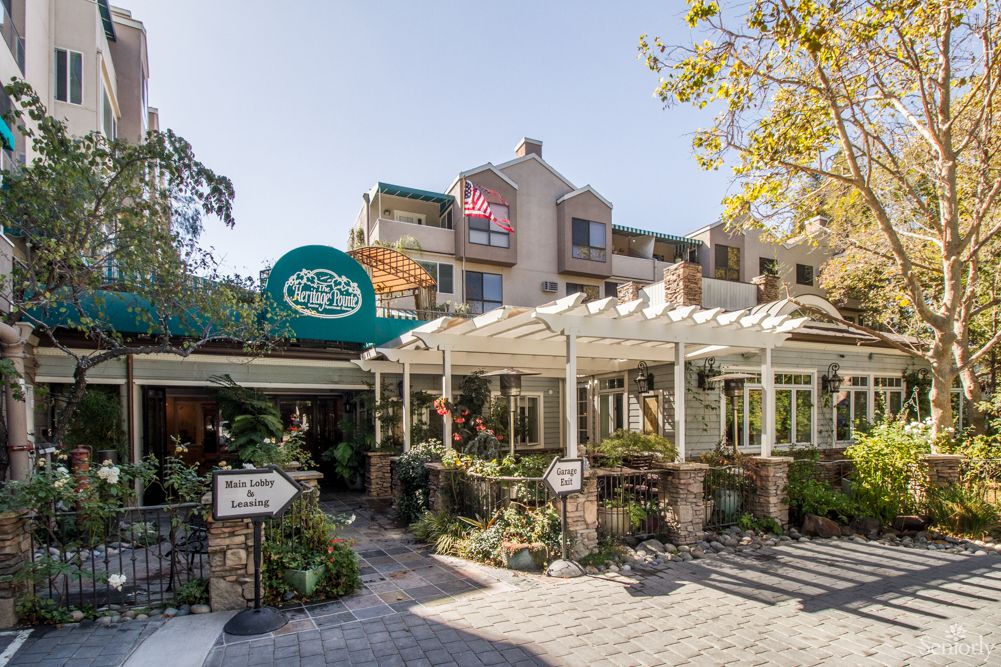 A charming restaurant with outdoor seating on a sunny day.