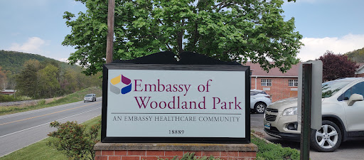 Signage for the Embassy of Woodland Park, an assisted healthcare community.