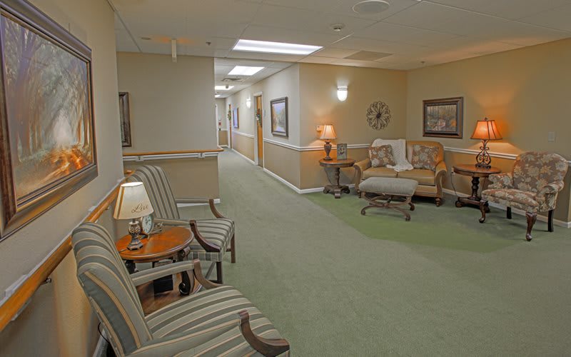 A cozy lobby area with seating and soft lighting.