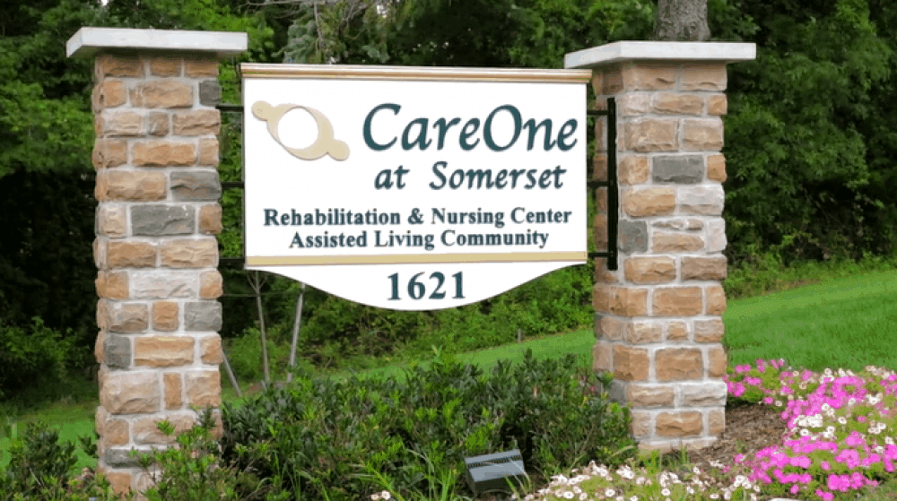 Sign for CareOne at Somerset, a rehabilitation and nursing center with assisted living services.