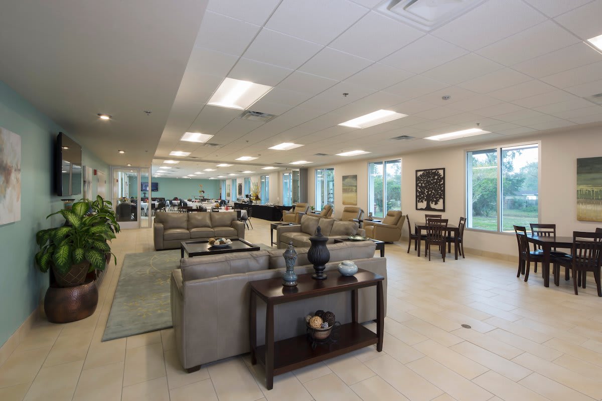 A modern and spacious lobby area with comfortable seating and bright lighting.