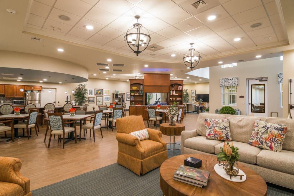 A cozy and modern living area with comfortable seating and warm lighting.