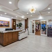 A modern reception area with stylish interior design and elegant lighting.