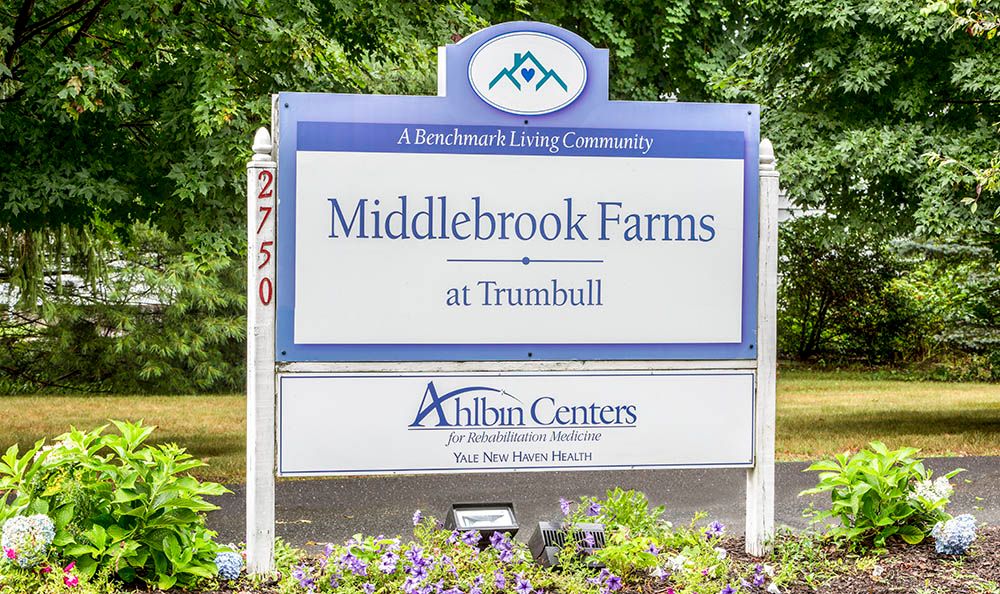 Sign for Middlebrook Farms at Trumbull, a retirement living community.