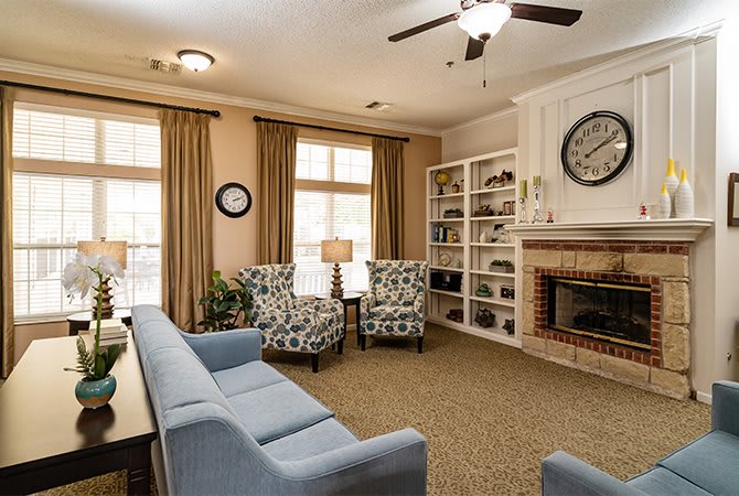 Cozy living room with a fireplace and comfortable seating.