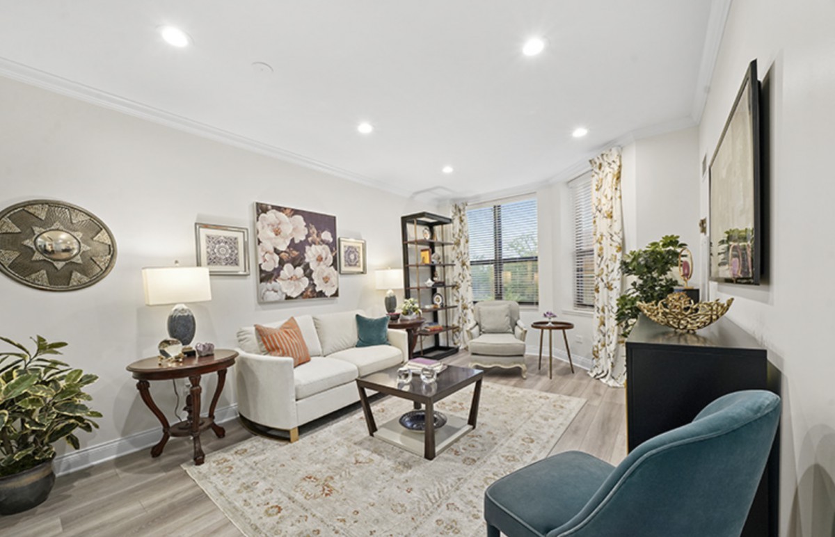 A modern living room featuring stylish furniture and elegant decor.