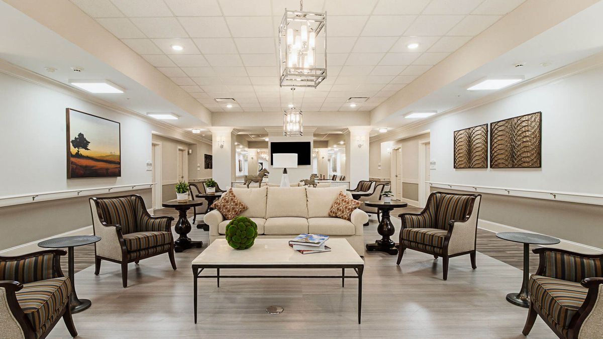 A modern and elegant living room with stylish furniture and sophisticated lighting.