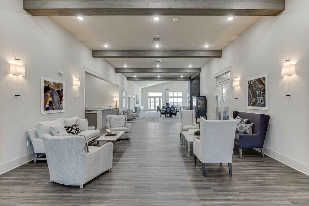A spacious and modern lobby with elegant seating areas and contemporary decor.