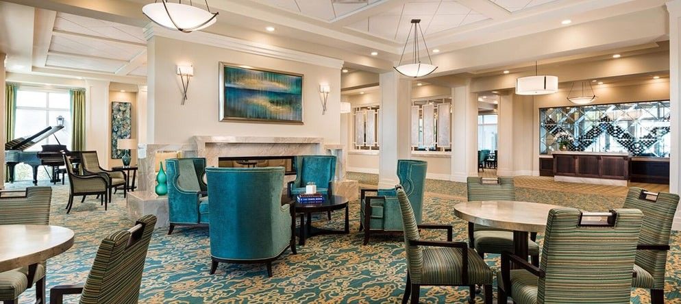 A modern and elegantly designed lobby with comfortable seating and stylish decor.
