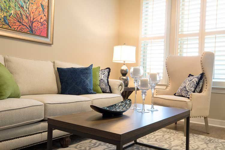 A cozy living room with elegant decor and natural lighting.