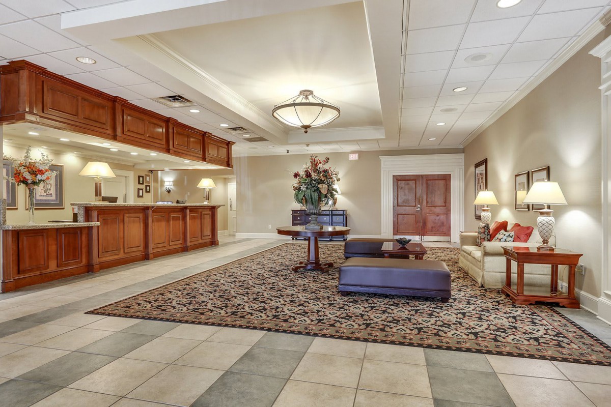 A spacious hotel lobby with elegant furnishings and a welcoming atmosphere.
