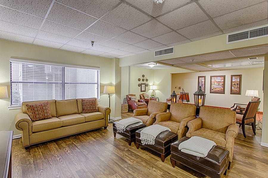 A cozy living room with comfortable seating and warm decor.