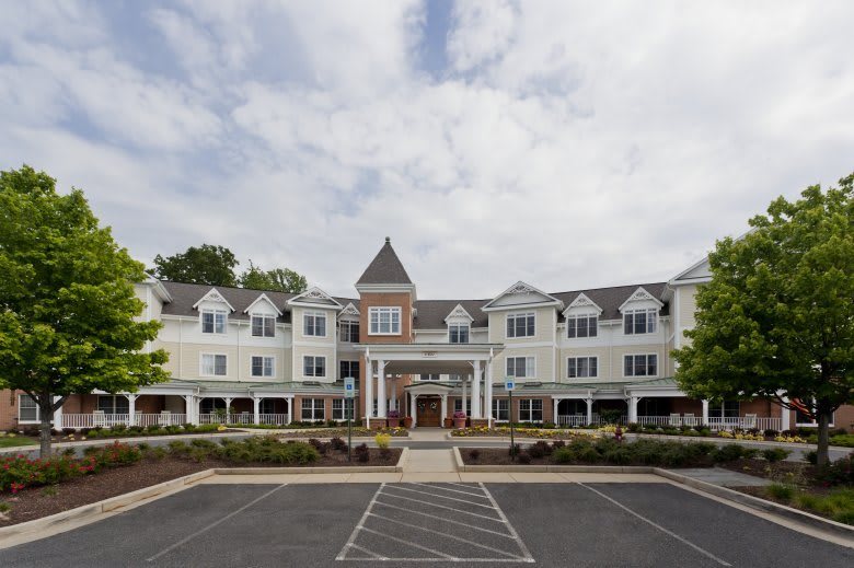 A grand hotel building with traditional architectural design and a prominent tower.