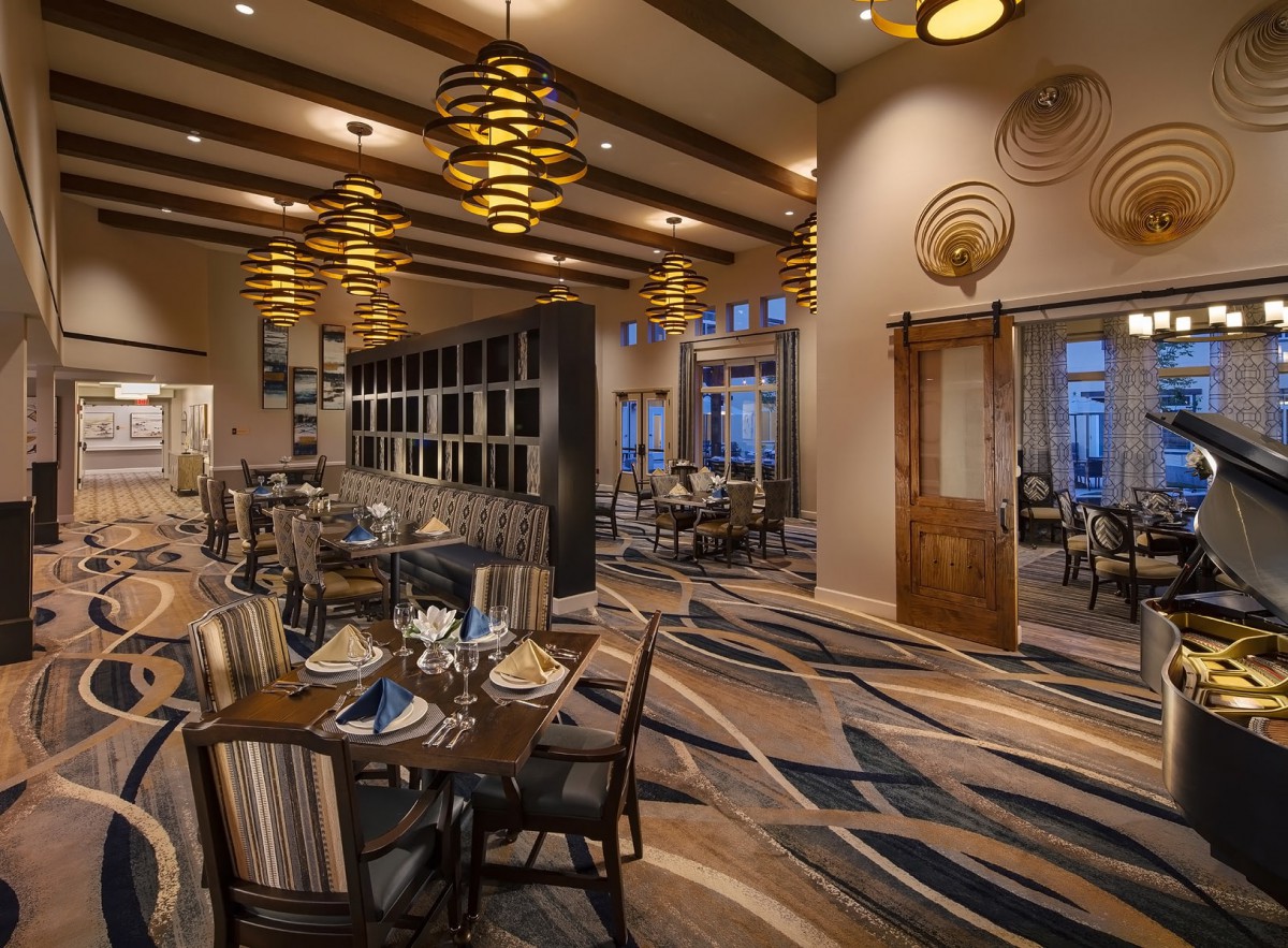 A modern restaurant interior with elegant lighting and stylish seating.