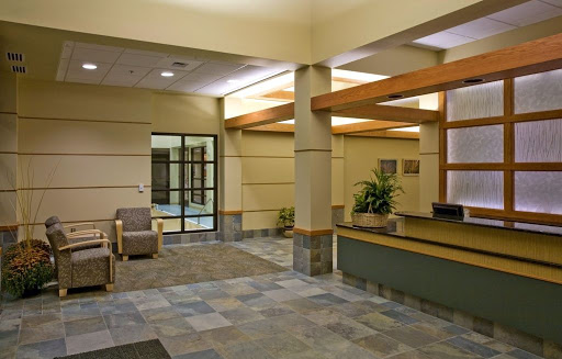 A spacious and inviting lobby with modern design elements and comfortable seating.