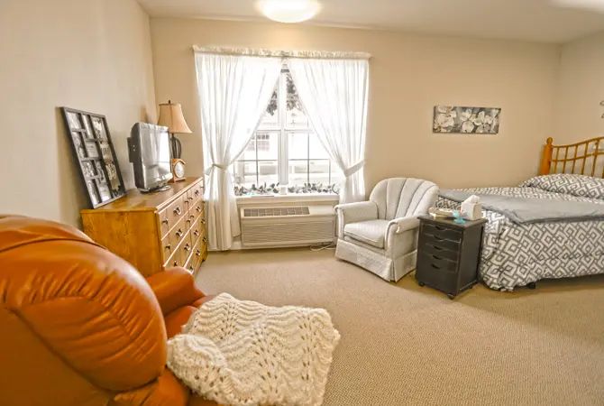 A cozy living room with comfortable seating and warm decor.
