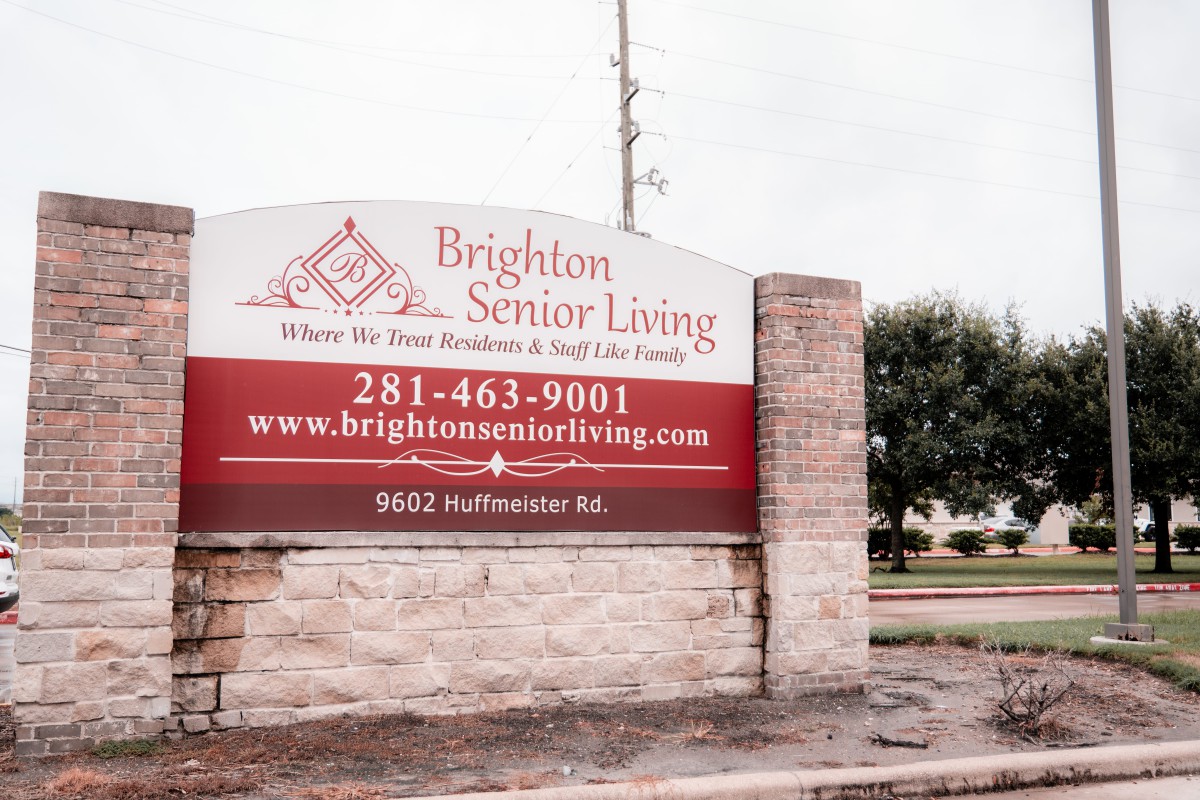 Sign for Brighton Senior Living with contact details.