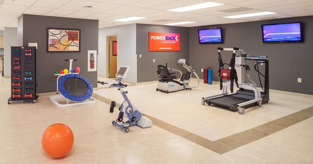 A well-equipped fitness center with various exercise machines and equipment.