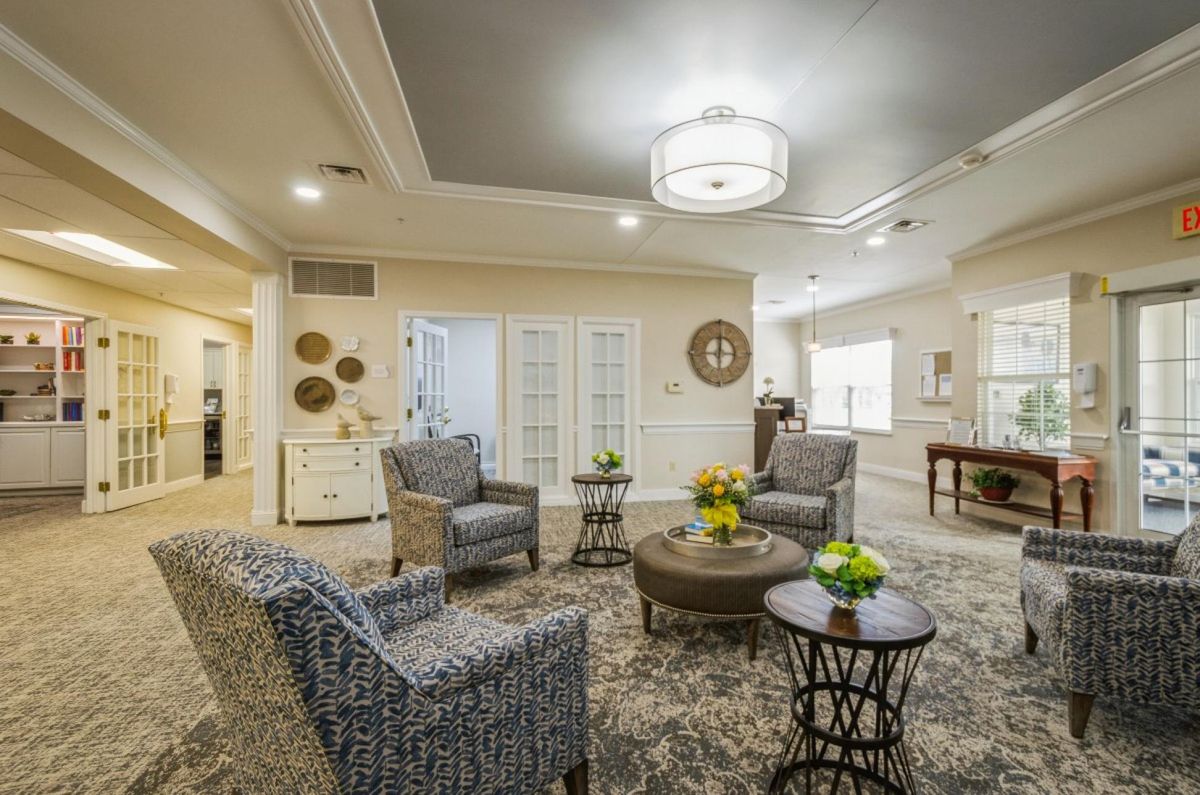 A stylish living room with comfortable armchairs and elegant decor.