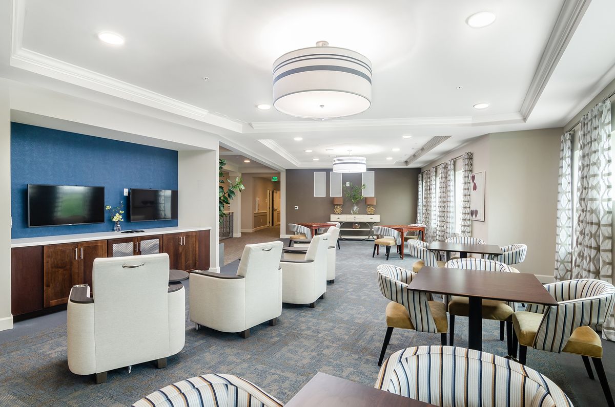 A modern lounge area with comfortable seating and stylish decor.