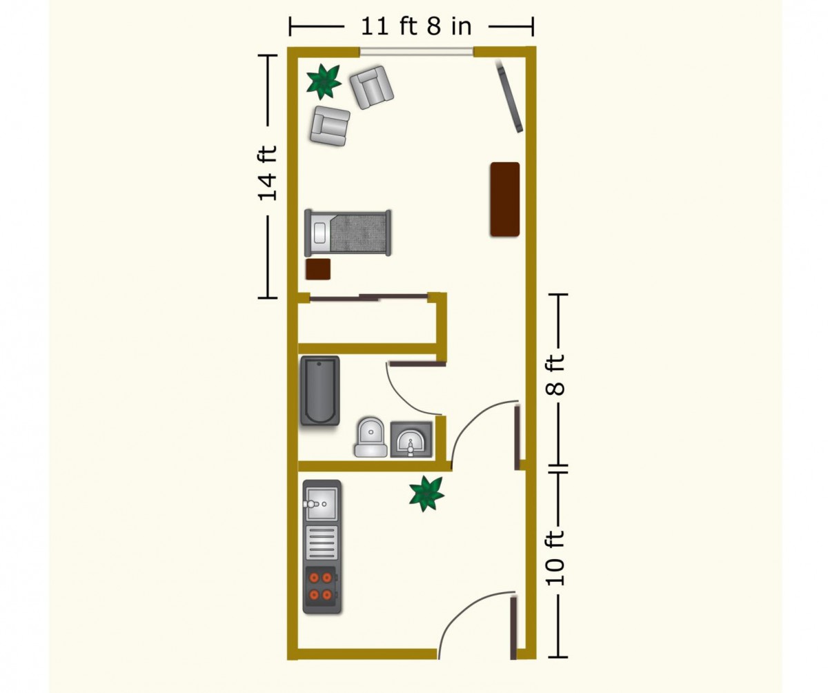 A floor plan of a small apartment featuring a living area, kitchen, and bathroom.