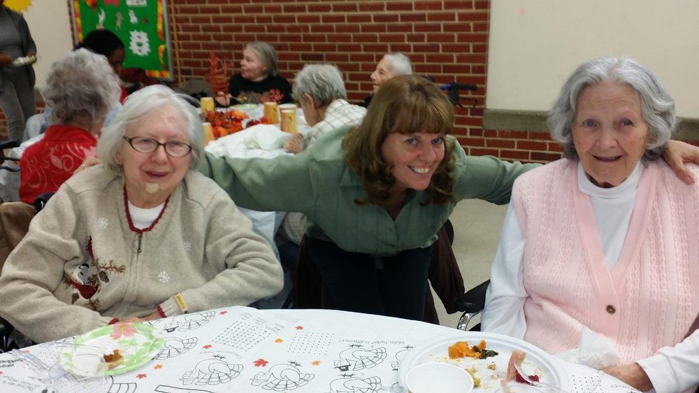 A group of people enjoying a social gathering indoors.