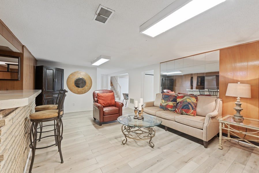 A cozy living room featuring comfortable seating and stylish decor.